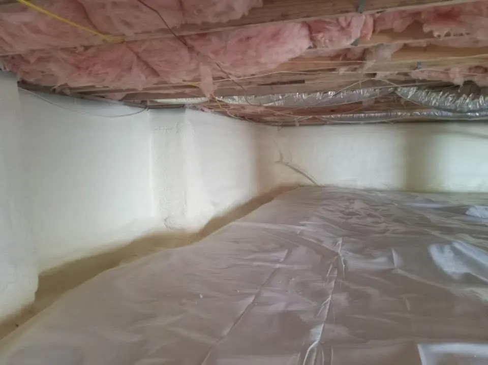Crawl space encapsulation with closed-cell spray foam for Commercial Roof Restoration in Kingstowne